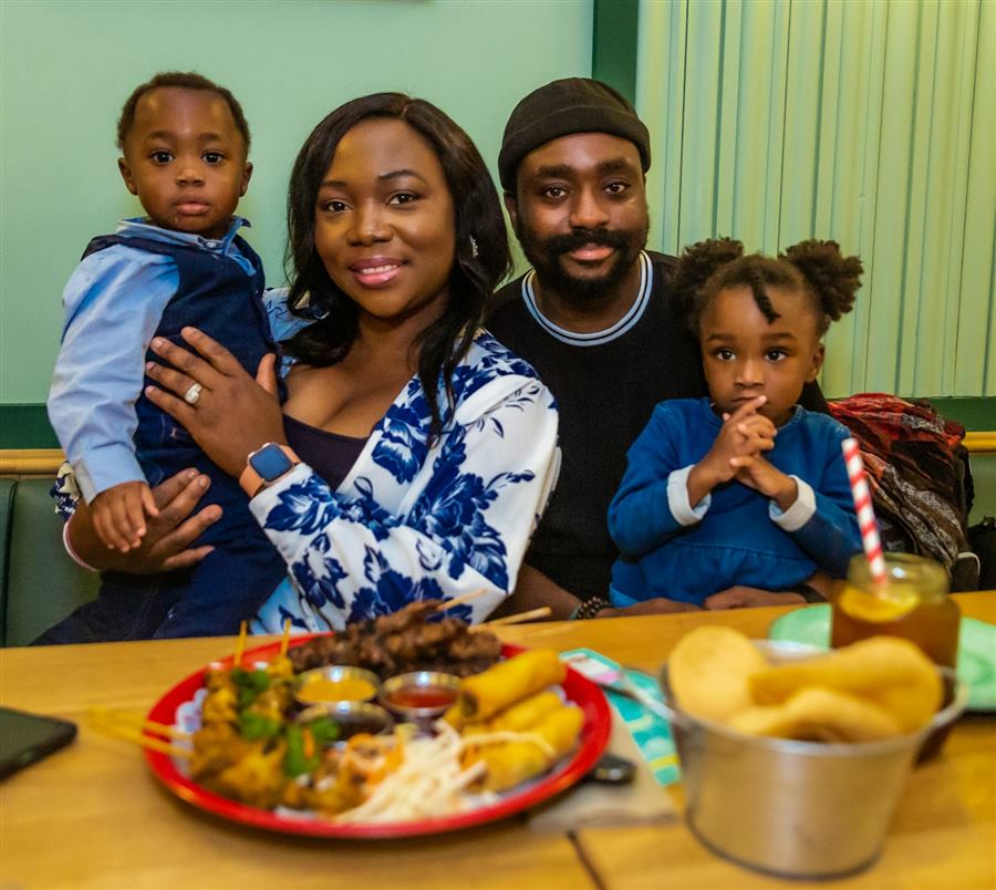 A family sharing a meal at the table